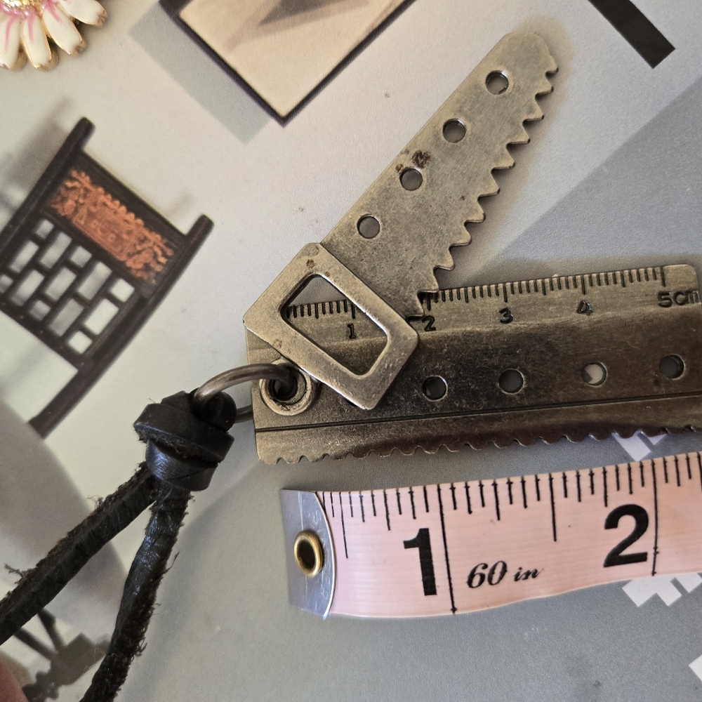 Leather Cord with Antique Style Brass Multi-Tool Pendants.